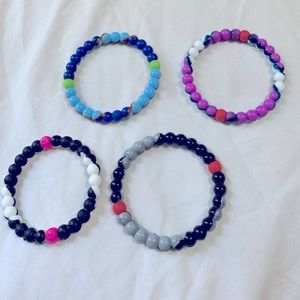 4 Lokai bracelets, like new